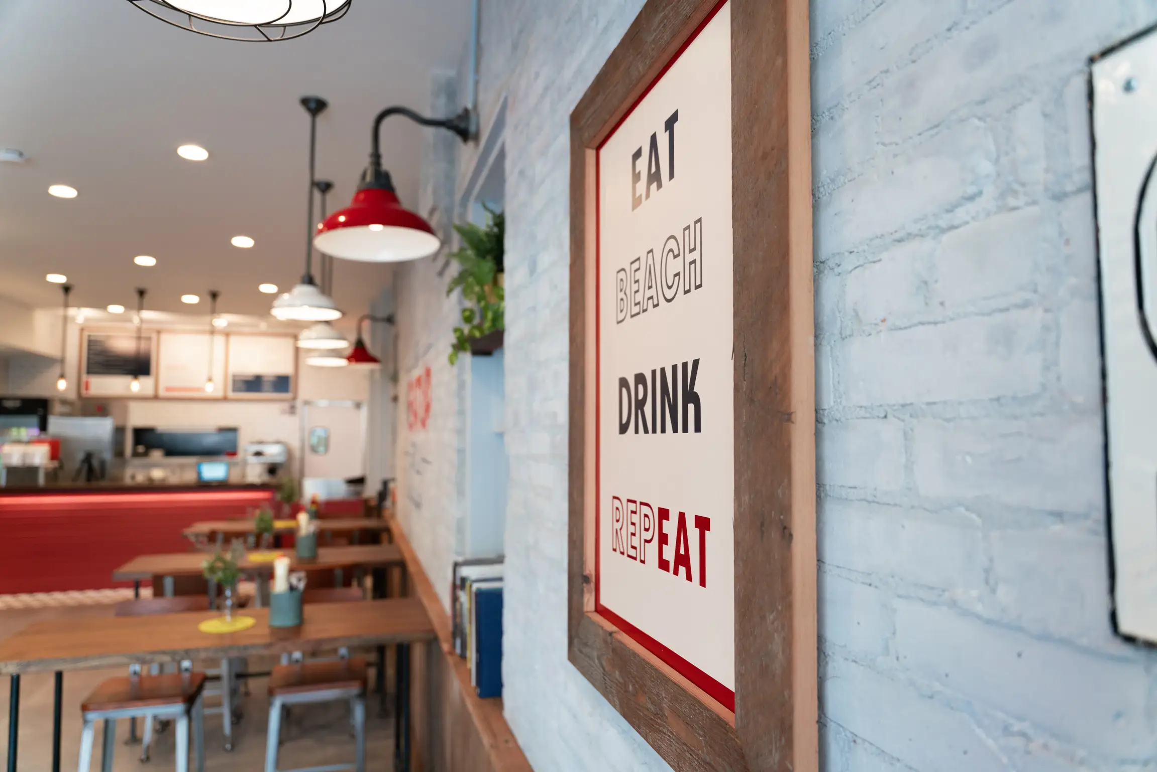 Interior view of The Meat Up Grill dining area, showcasing a casual and welcoming atmosphere.