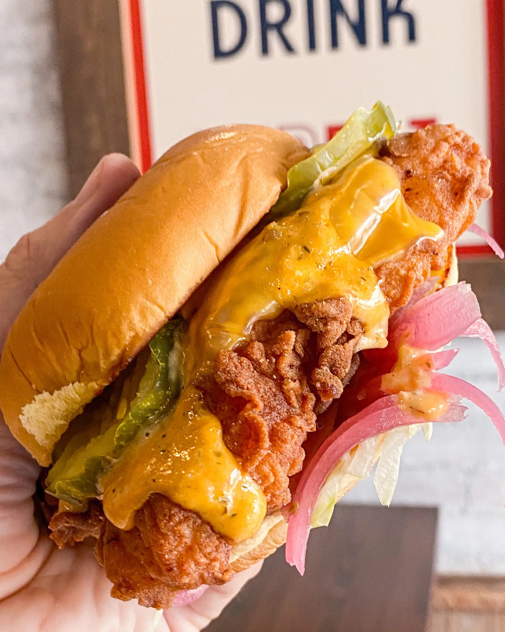 Crispy chicken sub sandwich from The Meat Up Grill, served fresh with toppings